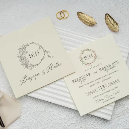 Invitație de nuntă elegantă cu monogramă florală și design minimalist – model rafinat premium